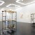 Platonic Constructions, wooden sticks, strings, pulley wheel, iron frame, electromotor, five different versions, 1997-2000. Exhibition view at Hamburger Kunsthalle - Galerie der Gegenwart, Hamburg, 2011 thumbnail