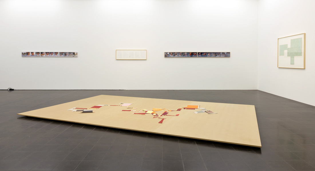 Peeled City II, cut paper (floor piece), drawing (pencil on millimeter paper), 5 sketches and a series of 15 C-prints, 2002. Exhibition view at Hamburger Kunsthalle - Galerie der Gegenwart, Hamburg, 2011 