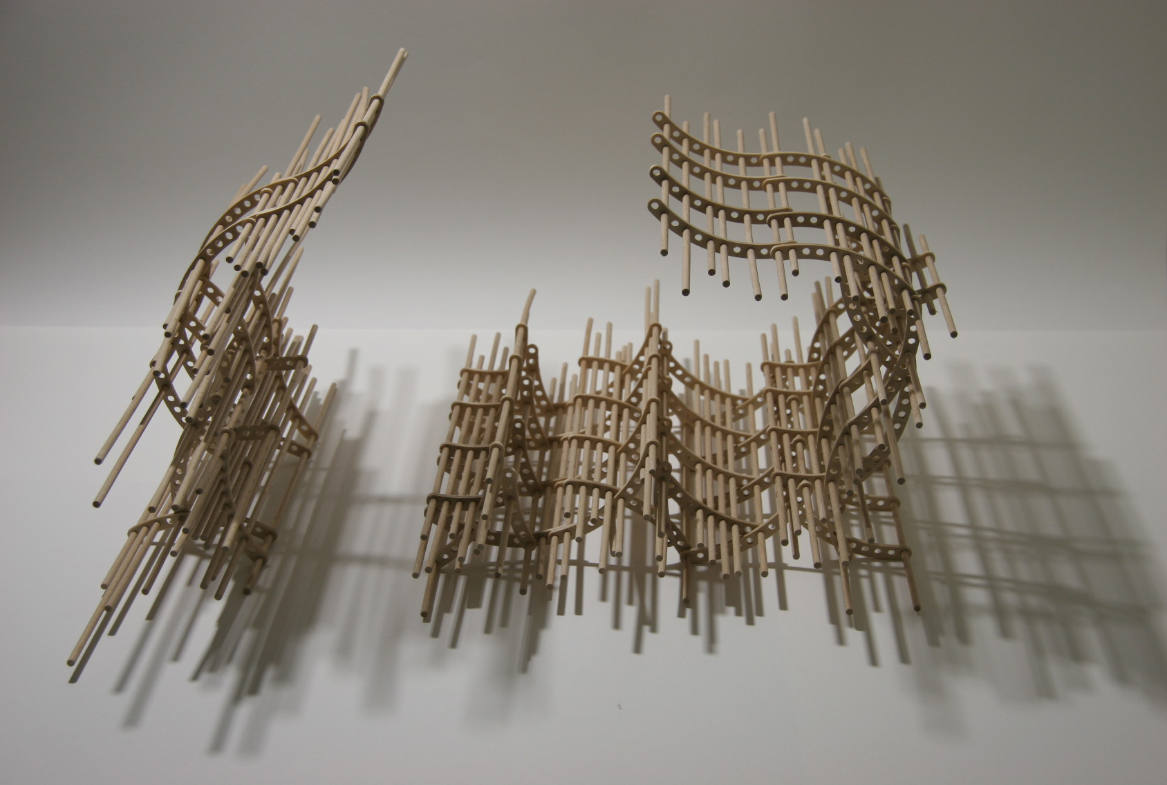 Solaris, 2009; plywood, wooden sticks, 56 x 58 x 30 cm
