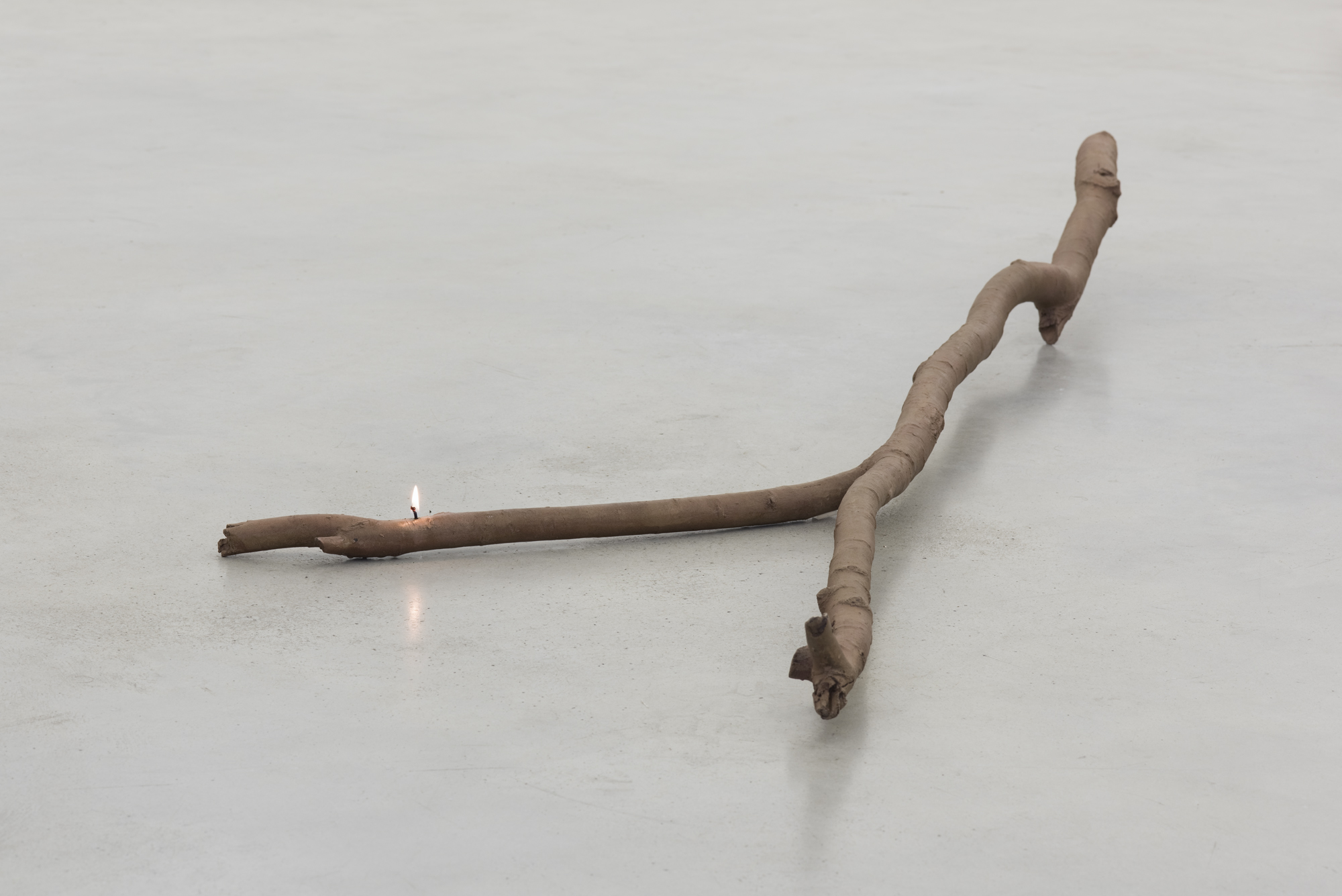 Ariel Schlesinger, At arm’s length, 2017, bronze, cotton wick, lamp oil, variable dimensions